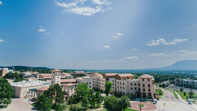 Summit Village with mountains in the background