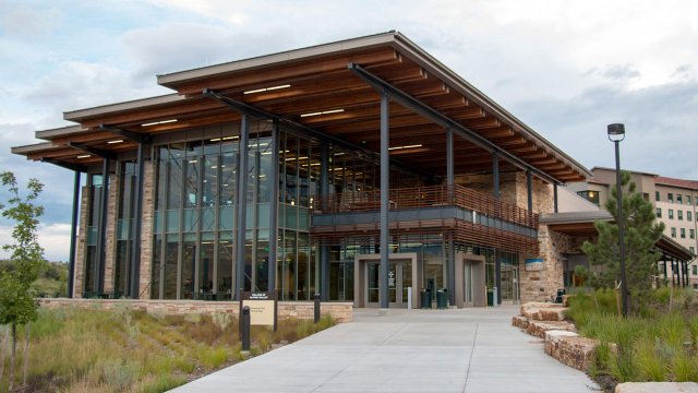 the exterior of the Roaring Fork dining hall during the day